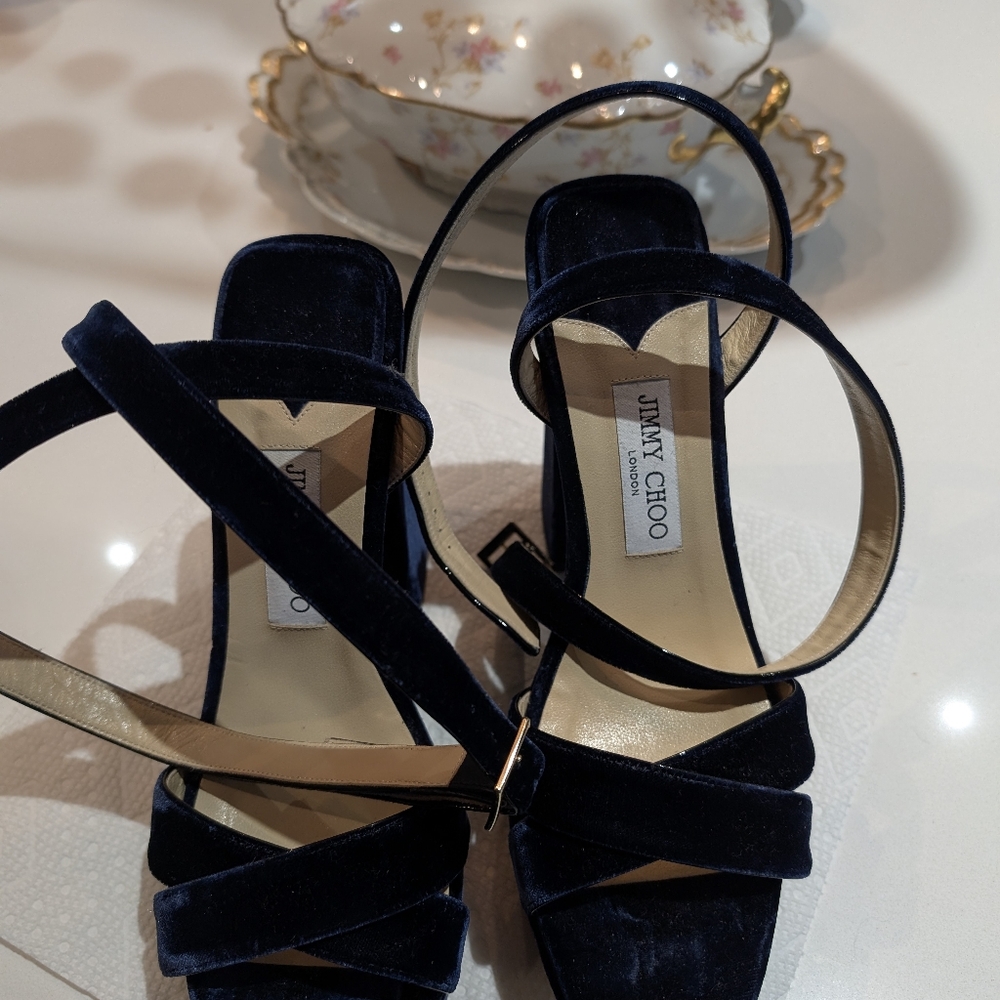 A pair of Navy blue Jimmy Choo sandals